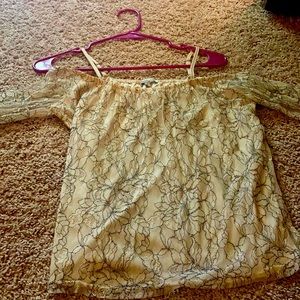 Charlotte Russe off the shoulder lace cream and black top .